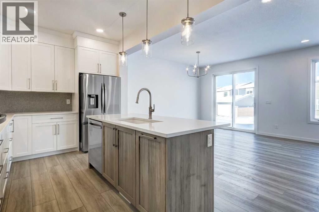 52 Magnolia Green Se, Calgary, Alberta T3M 3X8 - Photo 2 - A2273468