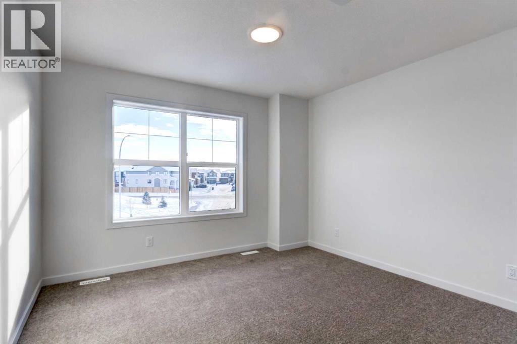 52 Magnolia Green Se, Calgary, Alberta T3M 3X8 - Photo 20 - A2273468