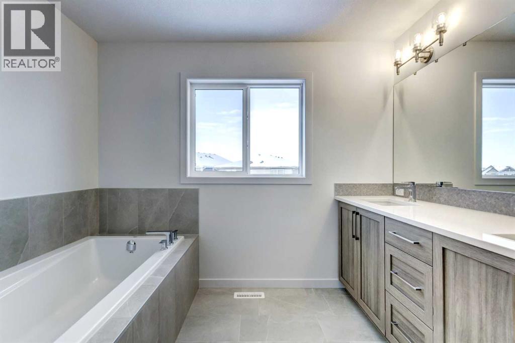 52 Magnolia Green Se, Calgary, Alberta T3M 3X8 - Photo 19 - A2273468