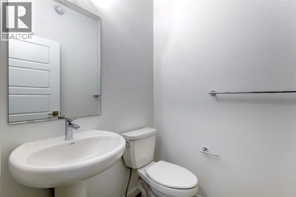 52 Magnolia Green Se, Calgary, Alberta T3M 3X8 - Photo 11 - A2273468