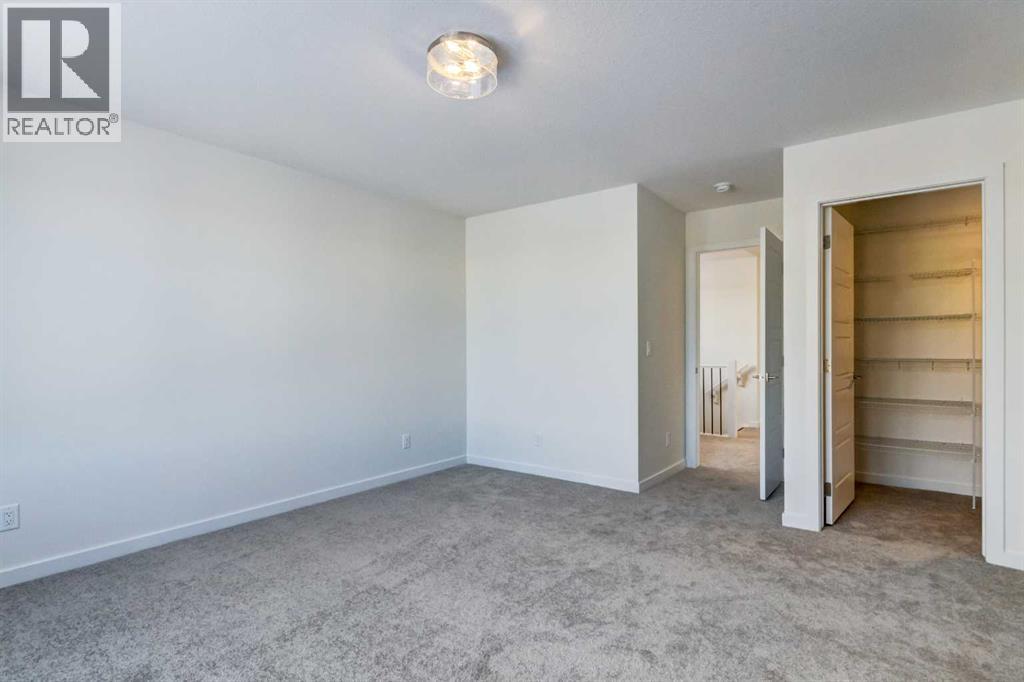 52 Magnolia Green Se, Calgary, Alberta T3M 3X8 - Photo 16 - A2273468