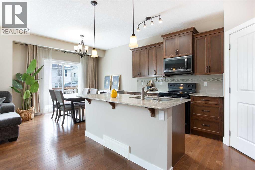 147 Morningside Mews SW, Airdrie, Alberta  T4B 0X2 - Photo 5 - A2297845