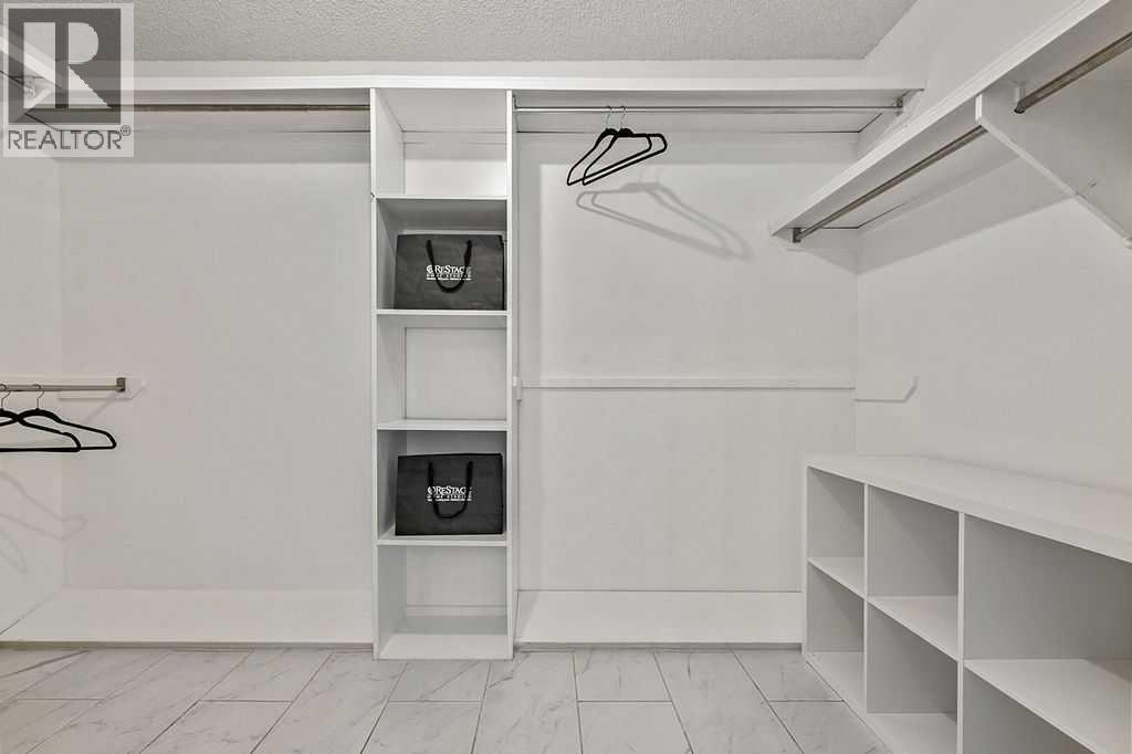 162 Woodbend Way, Okotoks, Alberta T1S 1M1 - Photo 36 - A2287796