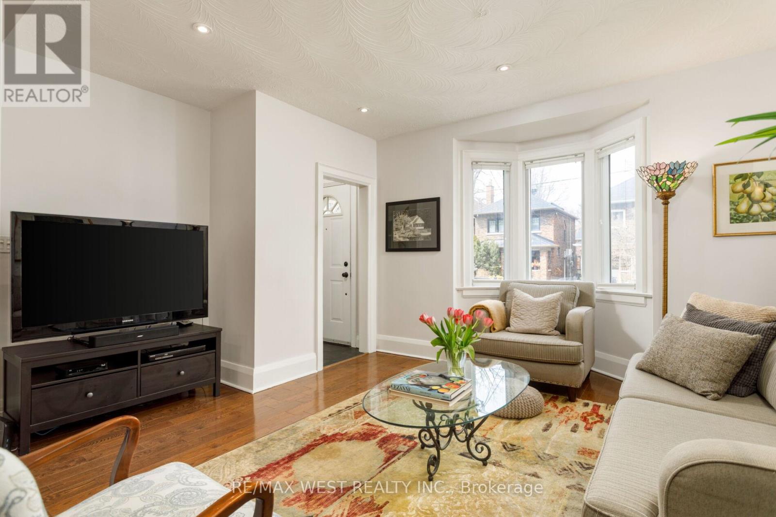 21 Harshaw Avenue, Toronto, Ontario  M6S 1X9 - Photo 5 - W12997980