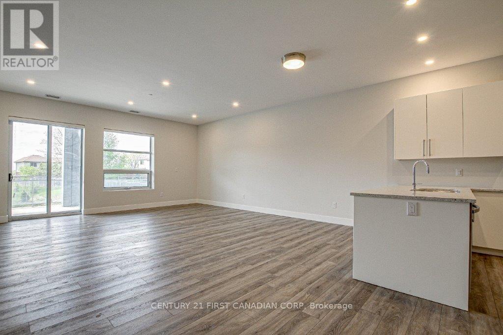 305 - 1696 Fiddlehead Place, London North, Ontario  N6G 5M6 - Photo 2 - X12998210