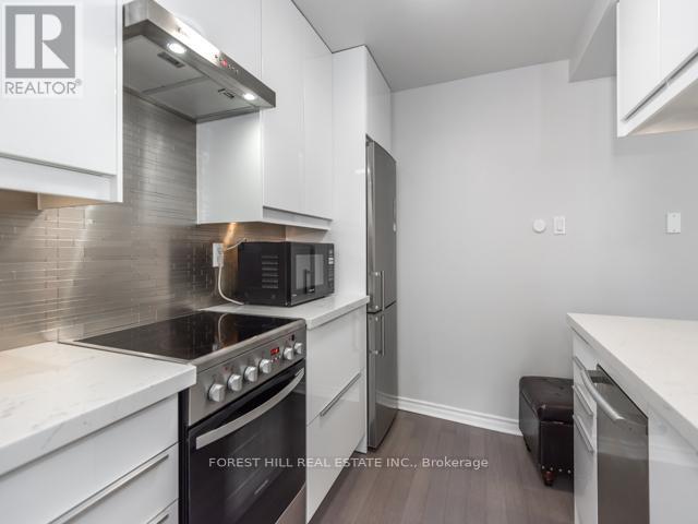 202 - 105 Mccaul Street, Toronto, Ontario M5T 2X4 - Photo 5 - C12998164