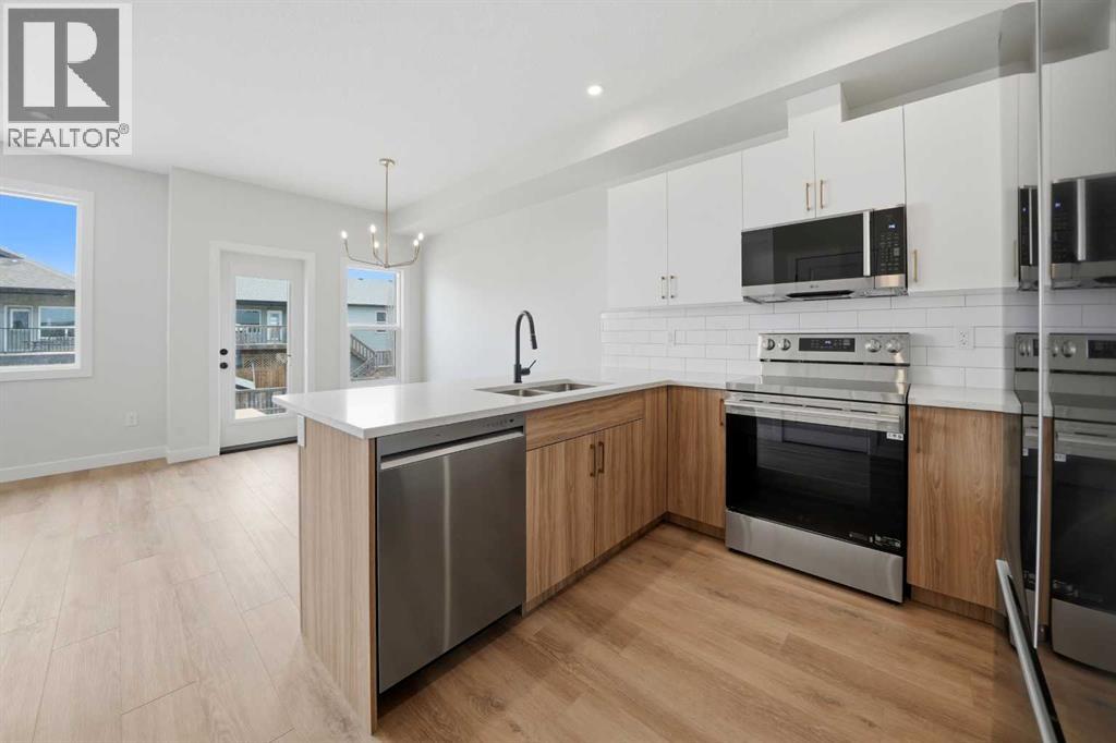 69 Pinnacle Close, Blackfalds, Alberta  T4M 0M3 - Photo 3 - A2298357