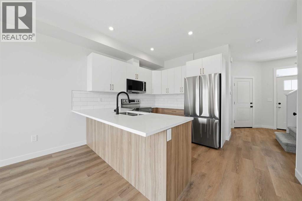 65 Pinnacle Close, Blackfalds, Alberta  T4M 0M3 - Photo 4 - A2298699