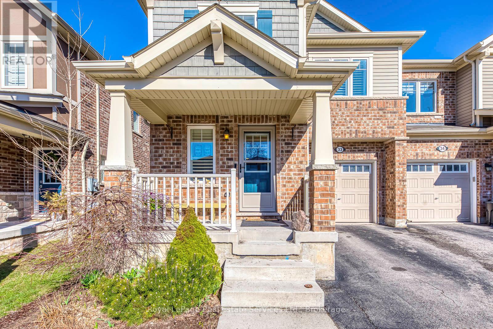 33 - 22 Spring Creek Drive, Hamilton, Ontario  L8B 1V7 - Photo 1 - X12998398