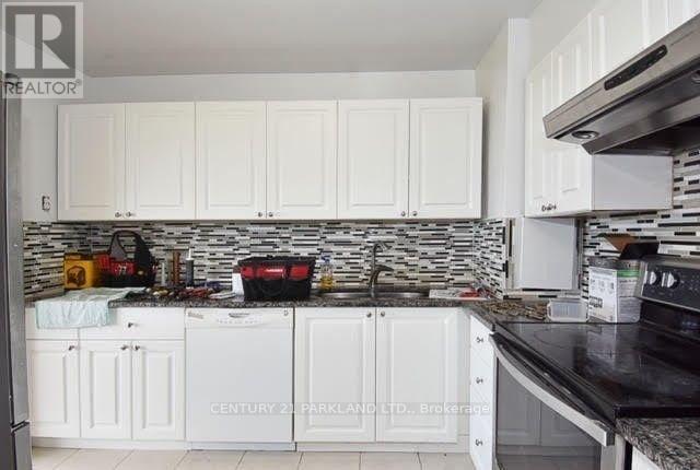 1703 - 10 Sunny Glenway Way, Toronto, Ontario  M3C 2Z3 - Photo 4 - C12998324