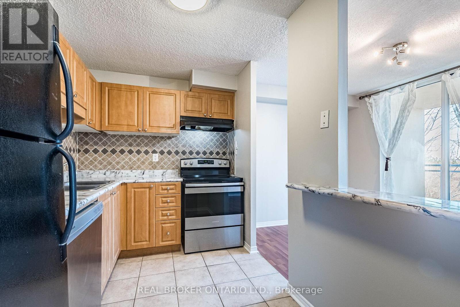 412 - 2900 Battleford Road, Mississauga, Ontario  L5N 2V9 - Photo 5 - W12998418