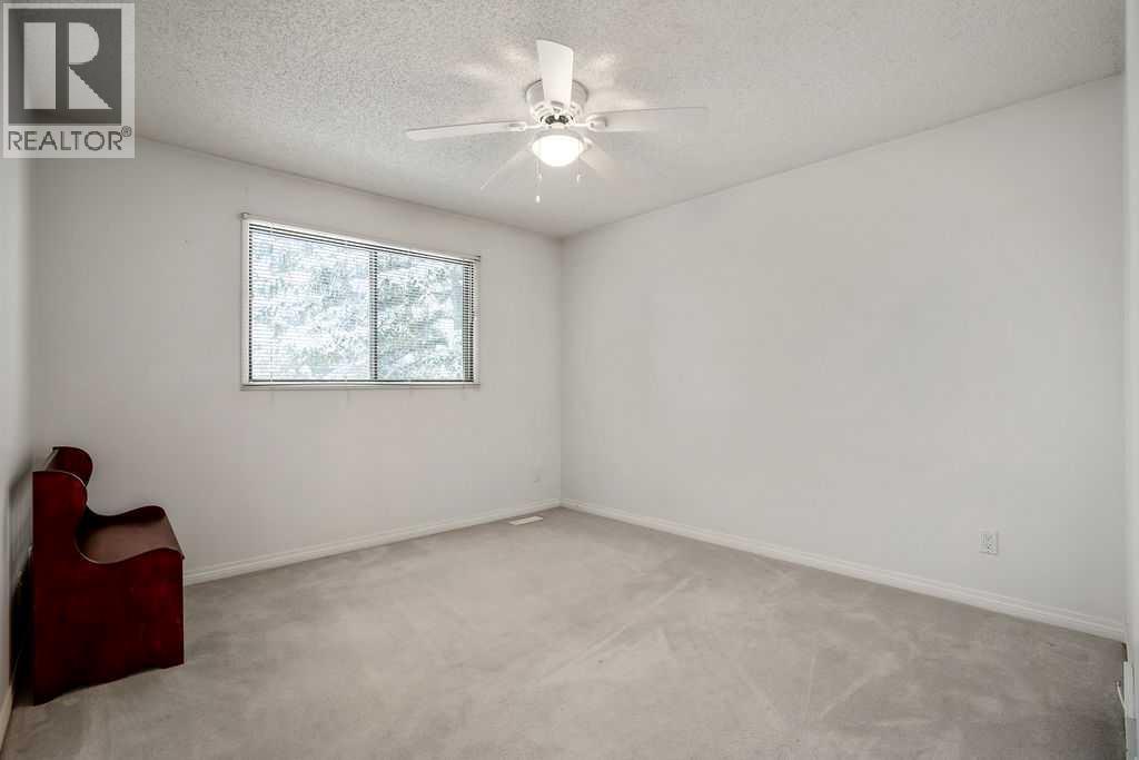 111 Deerfield Drive Se, Calgary, Alberta  T2J 6T9 - Photo 19 - A2292660