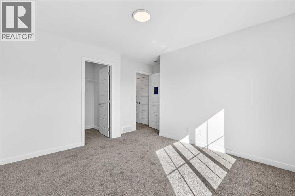 50 Creekside Way SW, Calgary, Alberta  T2X 6E2 - Photo 23 - A2300544