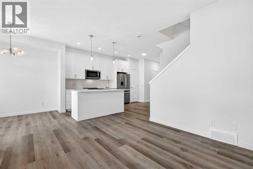 50 Creekside Way SW, Calgary, Alberta  T2X 6E2 - Photo 6 - A2300544