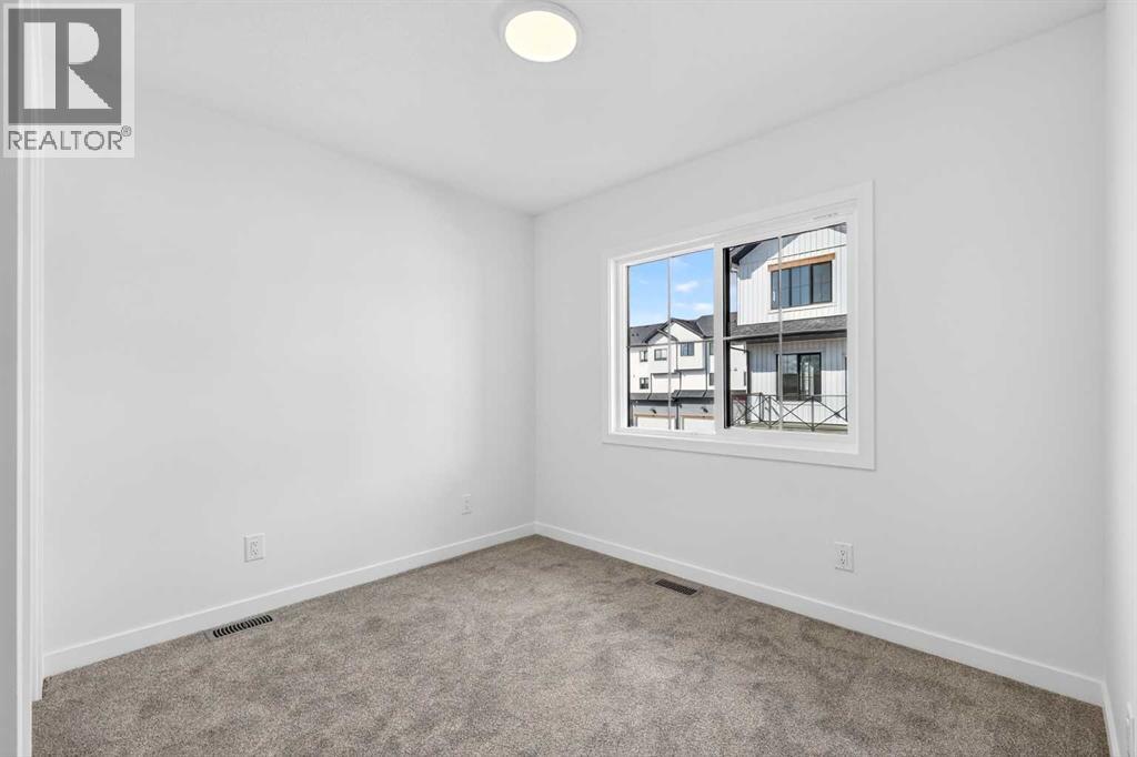 50 Creekside Way SW, Calgary, Alberta  T2X 6E2 - Photo 26 - A2300544