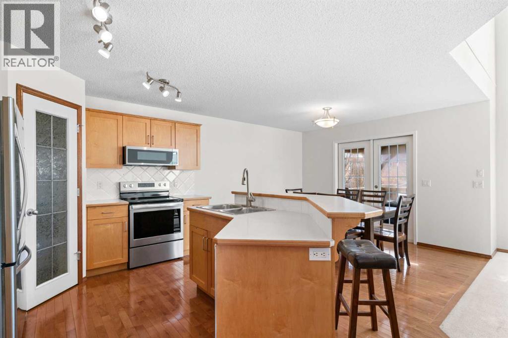 77 Cougarstone Circle Sw, Calgary, Alberta  T3H 4W3 - Photo 4 - A2300370