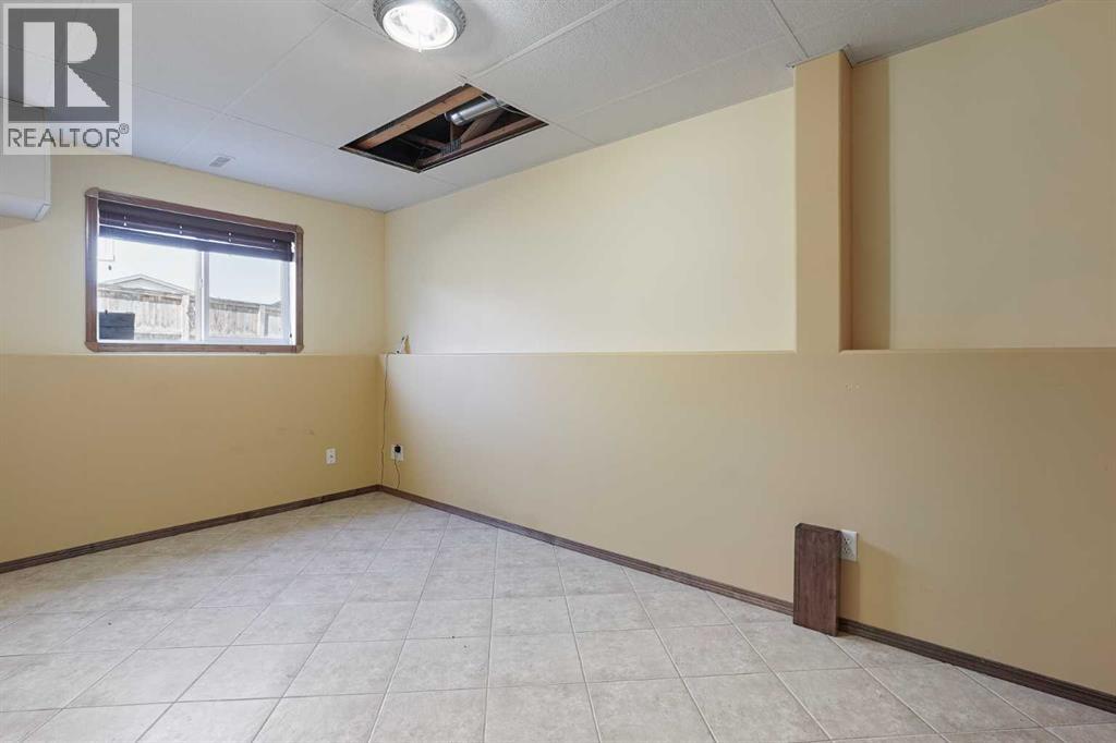 50 Thyrza Burkitt Place N, Lethbridge, Alberta  T1H 5M5 - Photo 33 - A2301459