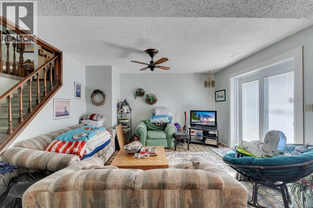 1003 Berkley Drive NW, Calgary, Alberta  T3K 1E3 - Photo 24 - A2301092