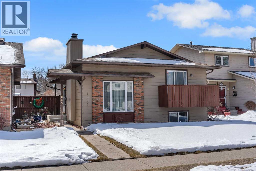 1003 Berkley Drive NW, Calgary, Alberta  T3K 1E3 - Photo 3 - A2301092