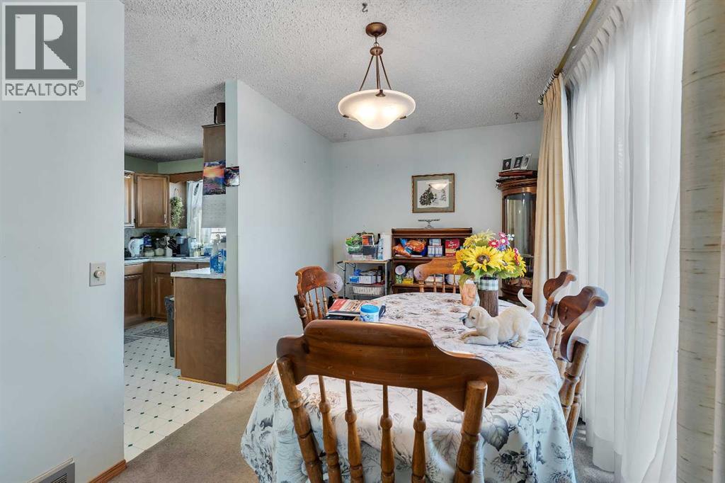 1003 Berkley Drive NW, Calgary, Alberta  T3K 1E3 - Photo 15 - A2301092