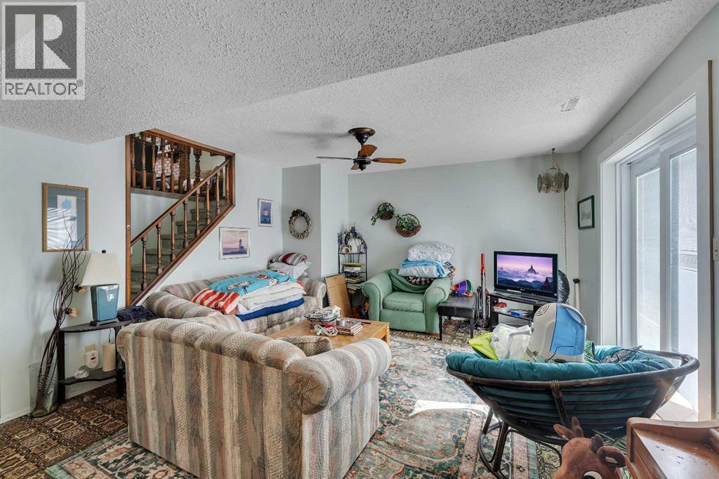 1003 Berkley Drive NW, Calgary, Alberta  T3K 1E3 - Photo 25 - A2301092