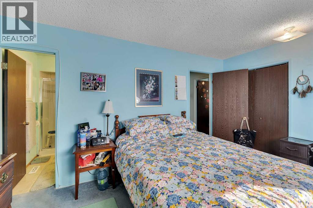 1003 Berkley Drive NW, Calgary, Alberta  T3K 1E3 - Photo 20 - A2301092