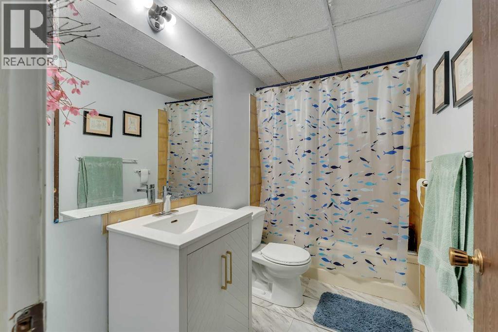 1003 Berkley Drive NW, Calgary, Alberta  T3K 1E3 - Photo 30 - A2301092