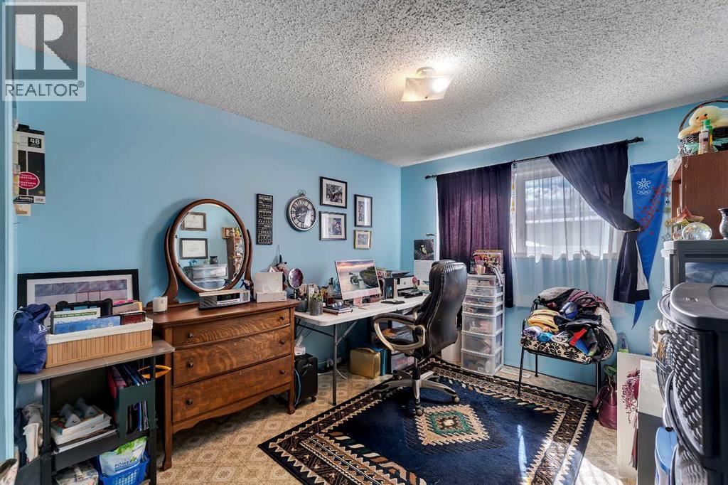 1003 Berkley Drive NW, Calgary, Alberta  T3K 1E3 - Photo 22 - A2301092