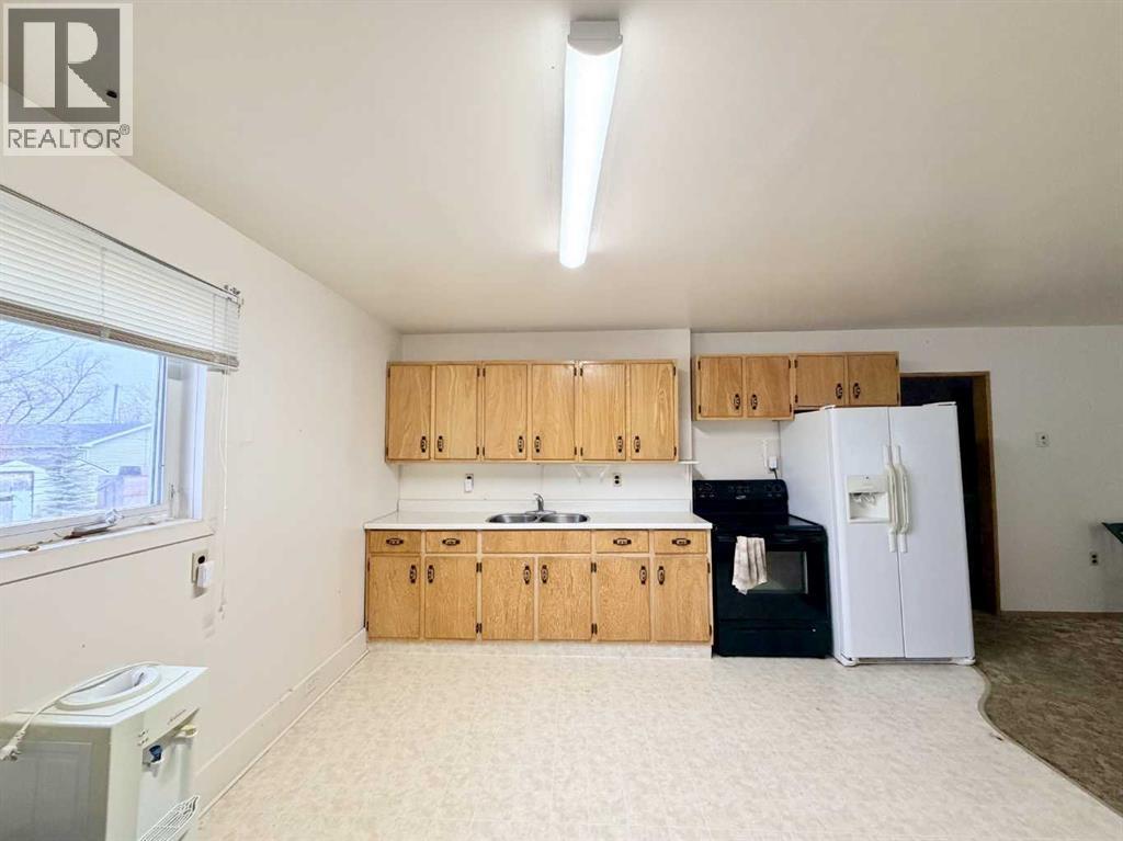 122 Trochu Avenue, Trochu, Alberta  T0M 2C0 - Photo 4 - A2300276