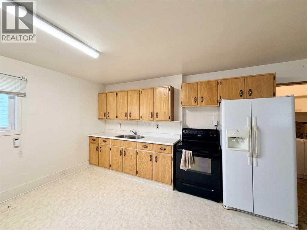 122 Trochu Avenue, Trochu, Alberta  T0M 2C0 - Photo 5 - A2300276