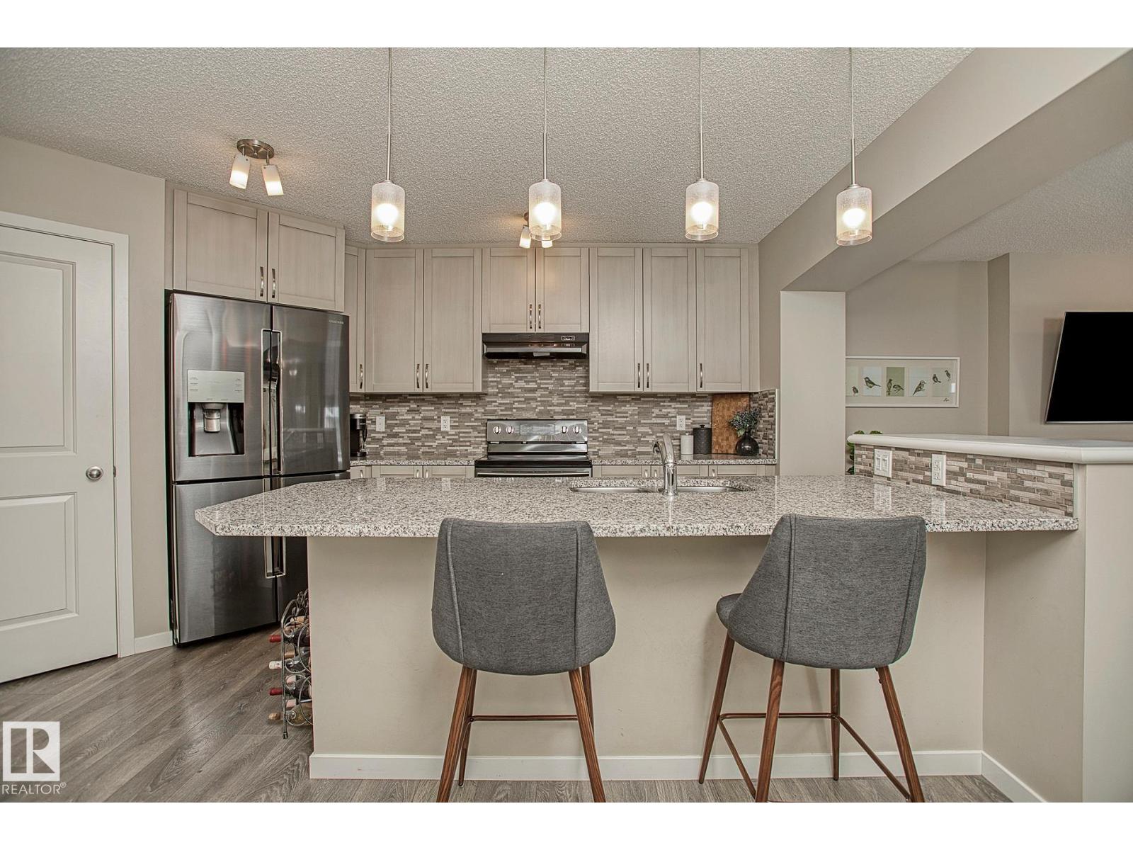 7718 Eifert Cr Nw, Edmonton, Alberta  T6M 0W2 - Photo 9 - E4482258