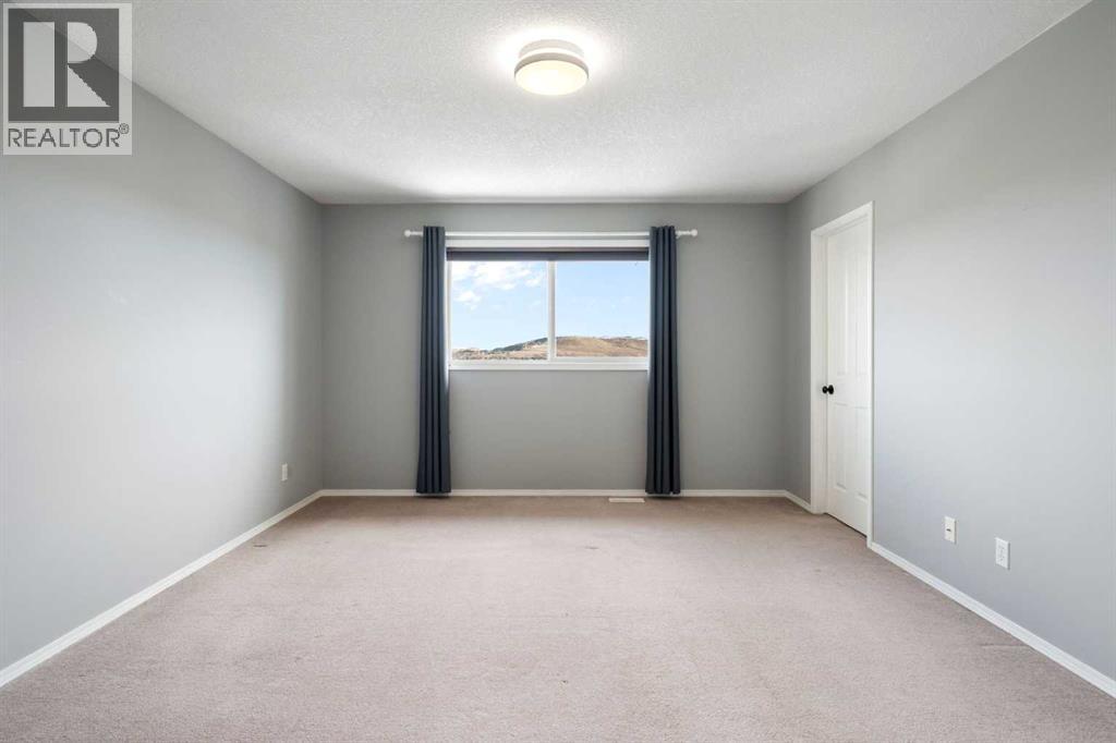 38 Bow Ridge Link Link, Cochrane, Alberta  T0L 0W5 - Photo 31 - A2300318