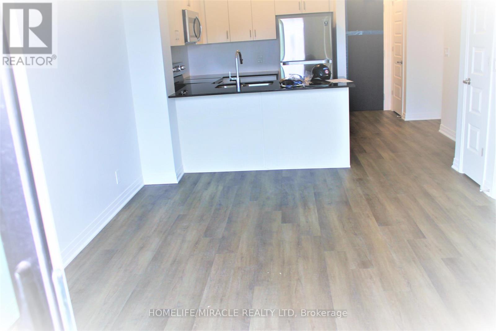 102 Grovewood Common, Oakville, Ontario  L6H 0X2 - Photo 2 - W12999070