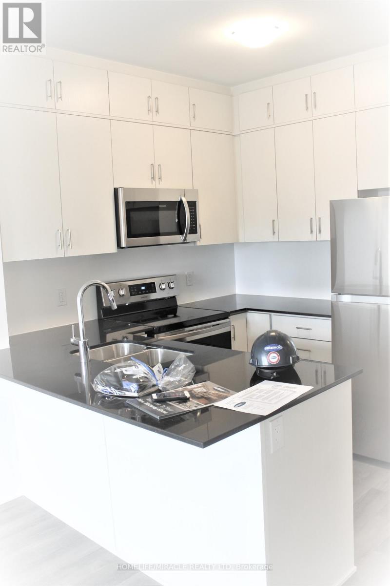 102 Grovewood Common, Oakville, Ontario  L6H 0X2 - Photo 3 - W12999070