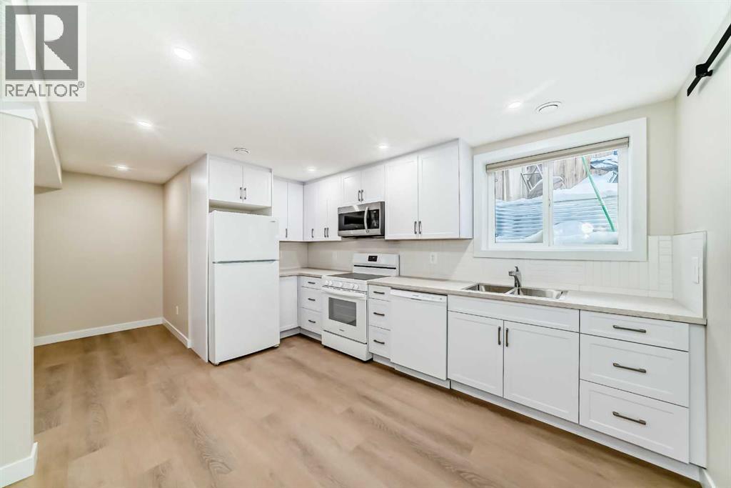 7406-7408 Hunterfield Road Nw, Calgary, Alberta  T2K 4L1 - Photo 31 - A2276447