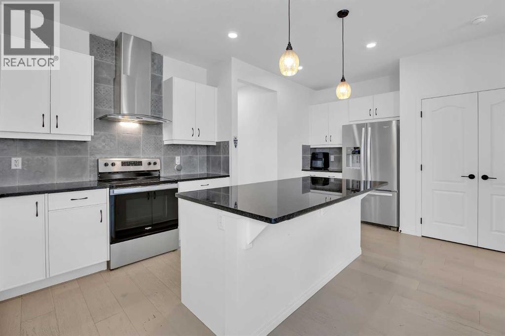 76 Edith Mews NW, Calgary, Alberta  T3R 1Y5 - Photo 13 - A2292373