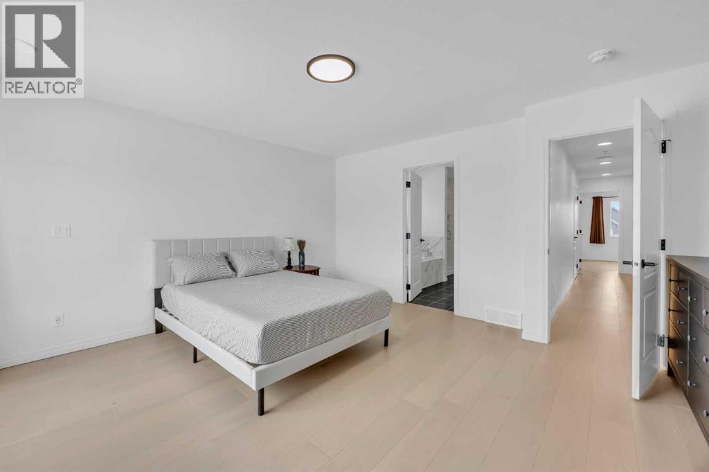 76 Edith Mews NW, Calgary, Alberta  T3R 1Y5 - Photo 22 - A2292373