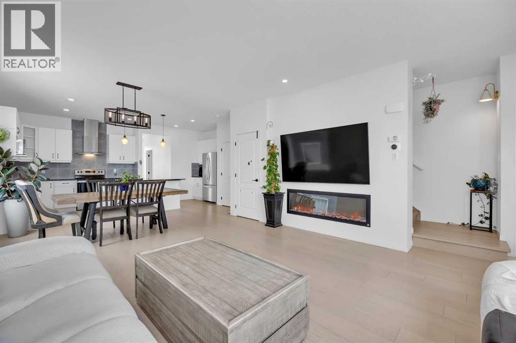 76 Edith Mews NW, Calgary, Alberta  T3R 1Y5 - Photo 5 - A2292373