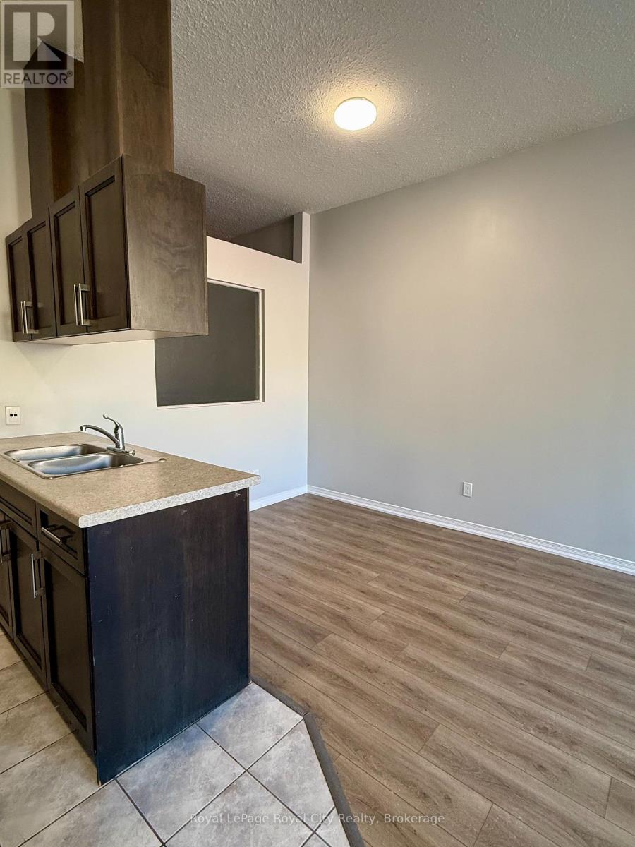 1 - 116 Wyndham Street N, Guelph, Ontario  N1H 4E8 - Photo 3 - X12999172