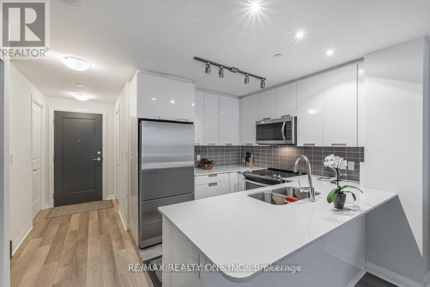 112 - 5025 Four Springs Avenue, Mississauga, Ontario  L5R 0G5 - Photo 2 - W12999254