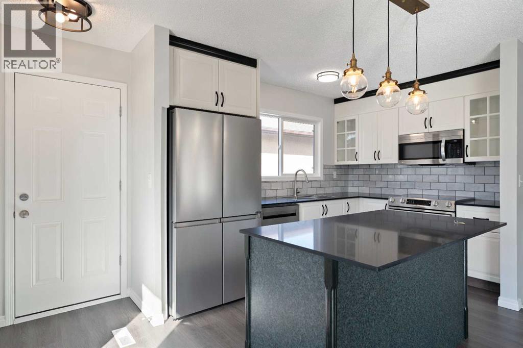 6808 Rundlehorn Drive Ne, Calgary, Alberta  T1Y 3V2 - Photo 6 - A2301051