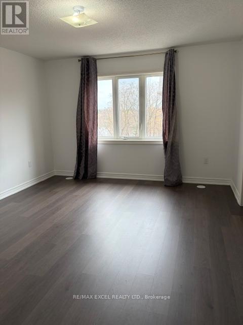 27 Spiv Grove Way, Markham, Ontario  L6E 0T6 - Photo 10 - N12999412