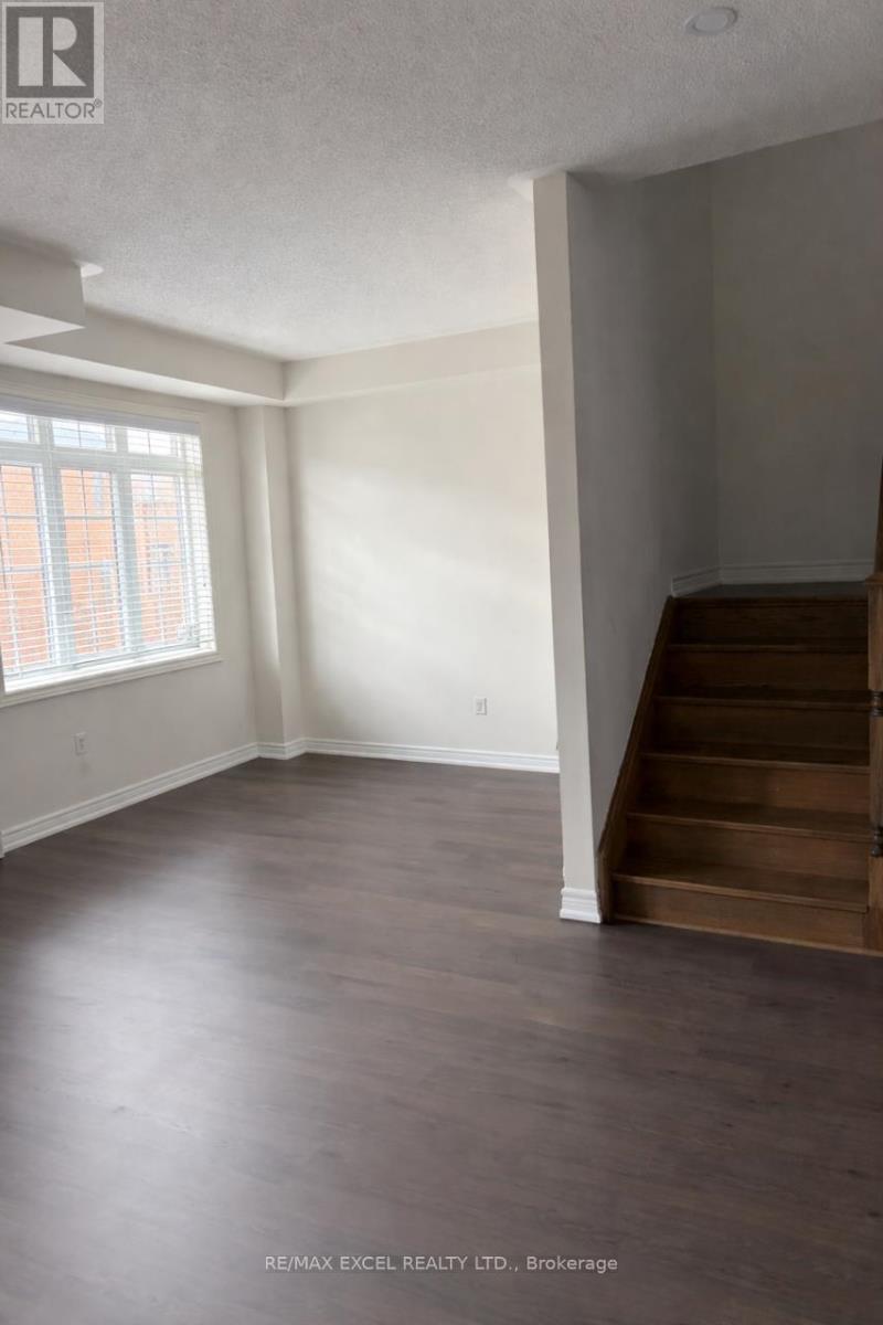 27 Spiv Grove Way, Markham, Ontario  L6E 0T6 - Photo 4 - N12999412