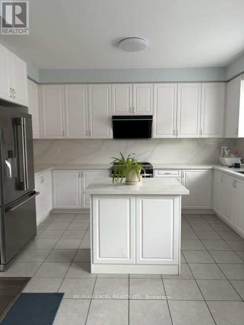 27 Spiv Grove Way, Markham, Ontario  L6E 0T6 - Photo 5 - N12999412