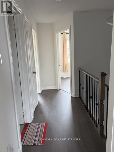 27 Spiv Grove Way, Markham, Ontario  L6E 0T6 - Photo 9 - N12999412