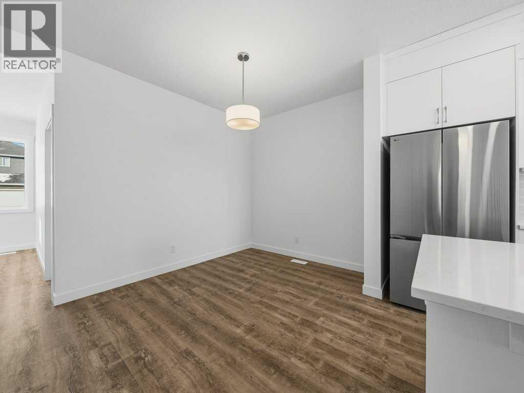 105 Creekstone Manor Sw, Calgary, Alberta  T2X 5W5 - Photo 10 - A2297741