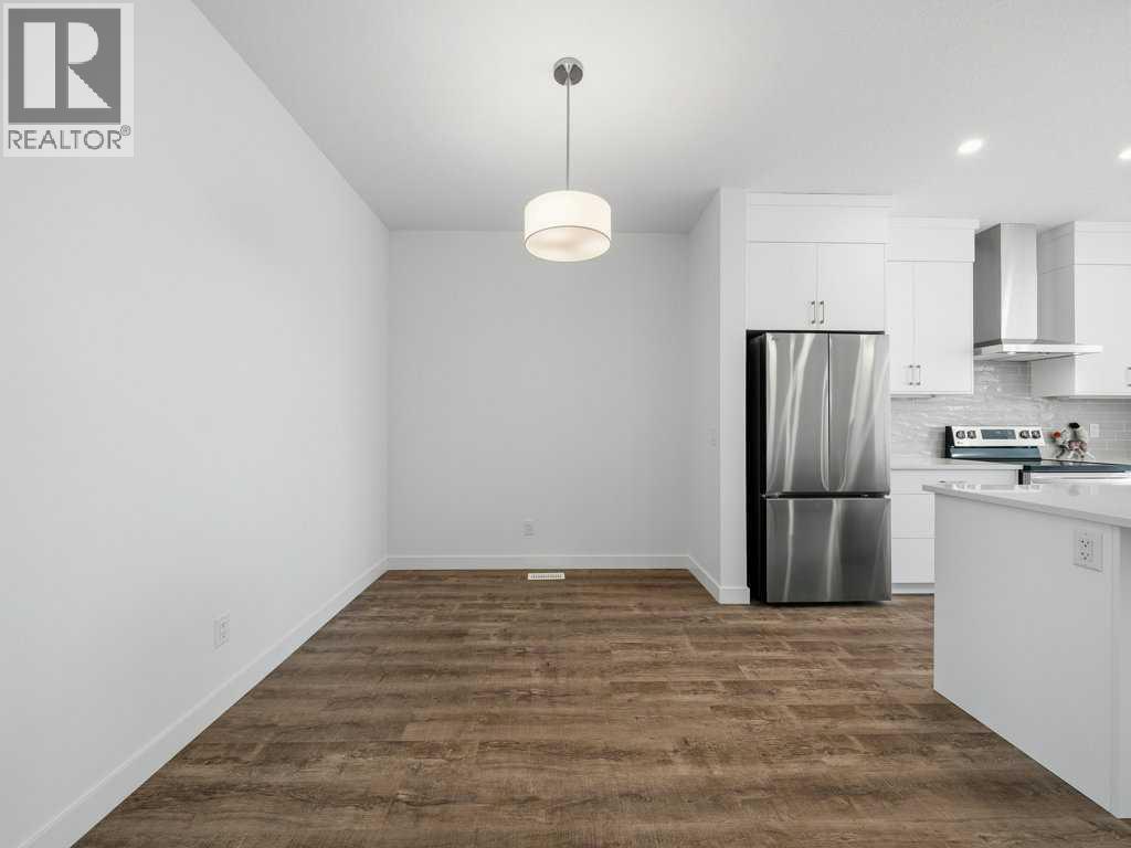 105 Creekstone Manor Sw, Calgary, Alberta  T2X 5W5 - Photo 11 - A2297741