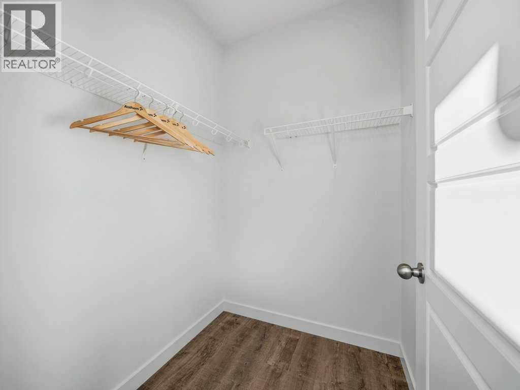 105 Creekstone Manor Sw, Calgary, Alberta  T2X 5W5 - Photo 16 - A2297741