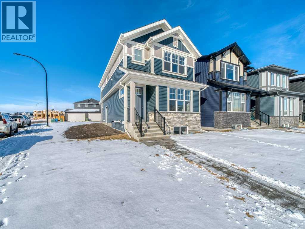 105 Creekstone Manor Sw, Calgary, Alberta  T2X 5W5 - Photo 2 - A2297741