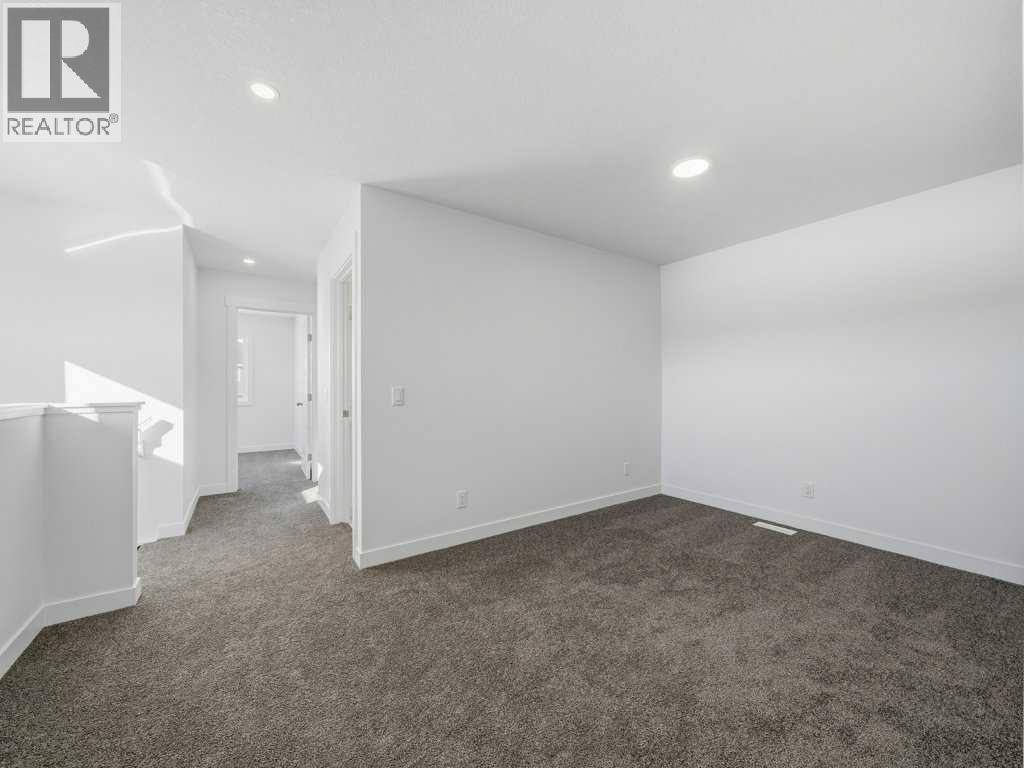 105 Creekstone Manor Sw, Calgary, Alberta  T2X 5W5 - Photo 19 - A2297741